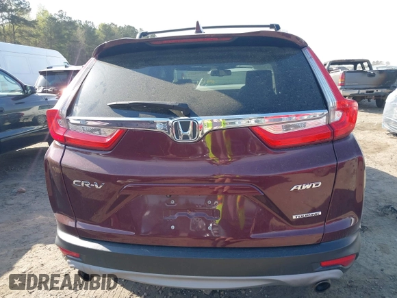 2018 Honda CR-V Touring with VIN 7FARW2H9XJE064414, listed as a IAAI auction lot 41904372 with 88,219 mi miles and . Bid and sale history available at DreamBid. Image 16.