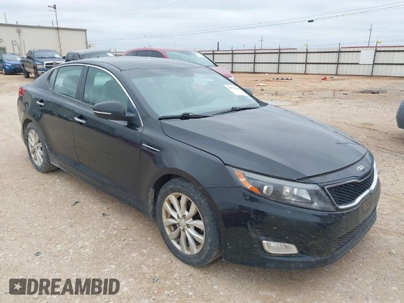 2015 Kia Optima LX with VIN 5XXGM4A71FG399420, listed as a IAAI auction lot 41928688 with 163,440 mi miles. Bid and sale history available at carsss.com. Image 1.