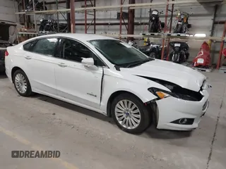 2013 Ford Fusion SE Hybrid with VIN 3FA6P0LU7DR254983, listed as a IAAI auction lot 41883531 with 188,585 mi miles and . Bid and sale history available at carsss.com. Image 1.