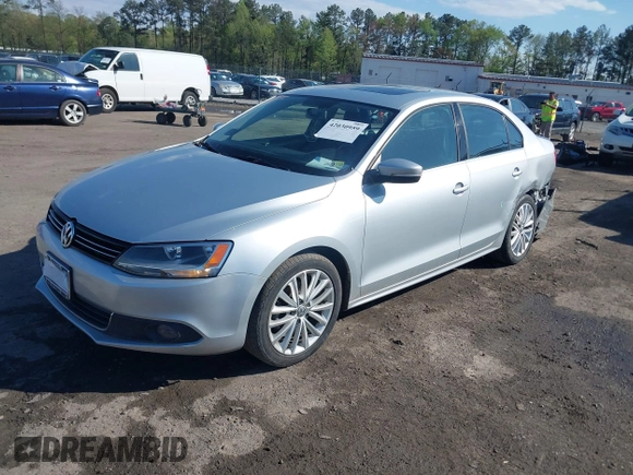 2014 Volkswagen Jetta TDI w/Premium with VIN 3VWLL7AJ2EM359341, listed as a IAAI auction lot 42030959 with 74,273 mi miles and . Bid and sale history available at DreamBid. Image 2.