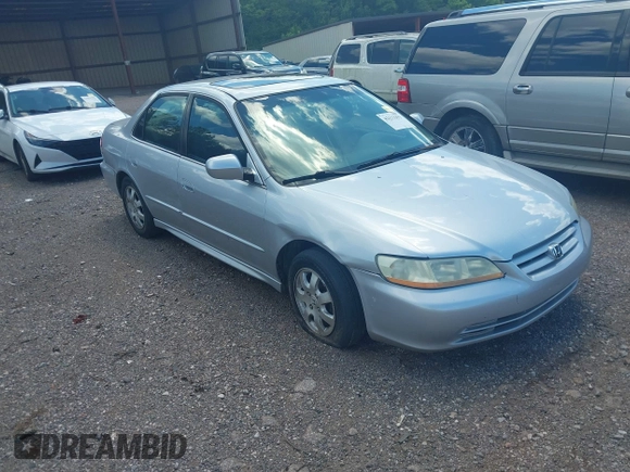 2002 Honda Accord EX z VIN 1HGCG56622A013090, wystawiony jako IAAI lot #42132291 z przebiegiem 152 567 mil mil oraz . Historia ofert i sprzedaży dostępna na DreamBid. Obrazek 1.