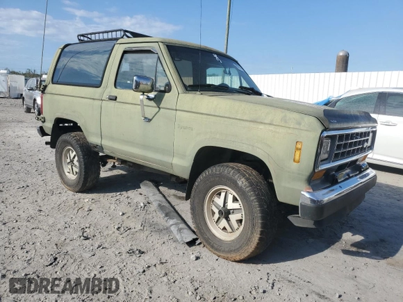 1987 Ford Bronco z VIN 1FMCU14T6HUC98971, wystawiony jako Copart lot #69262784 z przebiegiem 49 522 mil mil oraz Czysty tytuł • Clean title. Historia ofert i sprzedaży dostępna na DreamBid. Obrazek 4.
