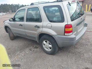 2001 Ford Escape XLS with VIN 1FMYU01141KA46852, listed as a IAAI auction lot 41616606 with 225,752 mi miles. Bid and sale history available at carsss.com. Image 3.