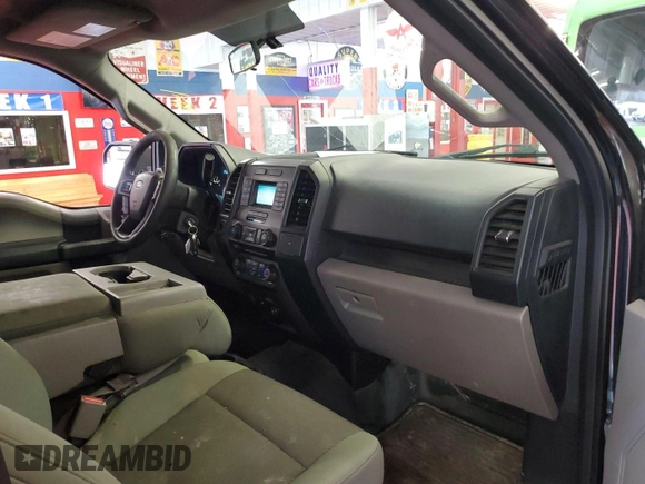 2015 Ford F-150 XL with VIN 1FTEX1C87FKD12113, listed as a IAAI auction lot 42786507 with 260,763 mi miles and . Bid and sale history available at DreamBid. Image 34.