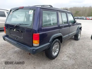 1998 Jeep Cherokee Sport with VIN 1J4FT68S2WL237956, listed as a IAAI auction lot 41846188 with 1 mi miles. Bid and sale history available at carsss.com. Image 4.