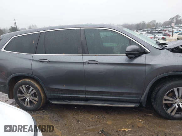 2017 Honda Pilot EX-L with VIN 5FNYF5H8XHB018480, listed as a IAAI auction lot 41049028 with 136,748 mi miles and . Bid and sale history available at DreamBid. Image 14.