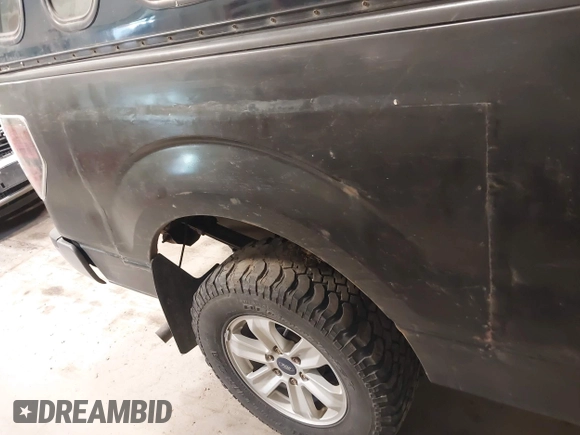 2012 Ford F-150 XL with VIN 1FTMF1EM9CKD89005, listed as a IAAI auction lot 42664014 with 142,413 mi miles and . Bid and sale history available at DreamBid. Image 6.