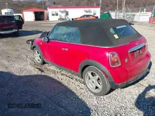 2010 MINI Convertible with VIN WMWMR3C59ATU97398, listed as a IAAI auction lot 41714054 with 12,663 mi miles and . Bid and sale history available at DreamBid. Image 3.