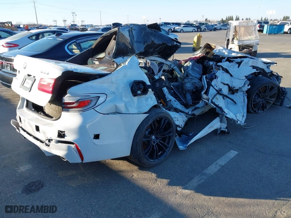 2019 BMW M5 with VIN WBSJF0C50KB284594, listed as a IAAI auction lot 41410008 with 1 mi miles. Bid and sale history available at carsss.com. Image 4.