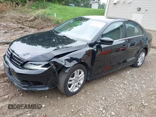 2017 Volkswagen Jetta S z VIN 3VW2B7AJ3HM303198, wystawiony jako IAAI lot #42651056 z przebiegiem 126 253 mil mil oraz . Historia ofert i sprzedaży dostępna na DreamBid. Obrazek 23.