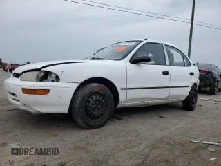 1996 Geo Prizm z VIN 1Y1SK5265TZ035968, wystawiony jako Copart lot #71472584 z przebiegiem 224 021 mil mil oraz Tytuł czysty. Historia ofert i sprzedaży dostępna na DreamBid. Obrazek 1.