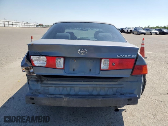 2000 Toyota Camry CE with VIN JT2BG22K9Y0521639, listed as a Copart auction lot 55075485 with 248,460 mi miles and Salvage Title. Bid and sale history available at carsss.com. Image 6.