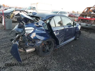 2017 Subaru WRX Limited with VIN JF1VA1L61H9800215, listed as a IAAI auction lot 40802029 with 83,099 mi miles. Bid and sale history available at carsss.com. Image 4.