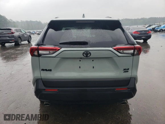 2022 Toyota RAV4 XLE Premium с VIN 2T3A1RFV1NW301243, выставлен на аукционе Copart как лот 56025835 с пробегом 58 093 миль миль и Списание • Salvage title. История ставок и продаж доступна на DreamBid. Изображение 6.