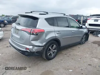 2018 Toyota RAV4 XLE with VIN JTMWFREV7JJ203609, listed as a IAAI auction lot 41938100 with 51,021 mi miles. Bid and sale history available at carsss.com. Image 4.