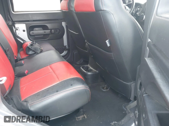 2014 Jeep Wrangler Unlimited Sport with VIN 1C4BJWDG3EL135351, listed as a IAAI auction lot 41947408 with 104,460 mi miles. Bid and sale history available at carsss.com. Image 8.
