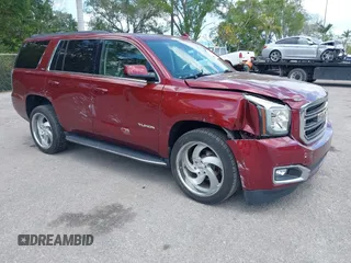 2020 GMC Yukon SLT z VIN 1GKS1BKC4LR242383, wystawiony jako IAAI lot #42104912 z przebiegiem 55 017 mil mil oraz . Historia ofert i sprzedaży dostępna na DreamBid. Obrazek 1.
