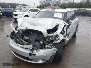 2013 MINI Cooper Countryman with VIN WMWZB3C5XDWR35844, listed as a IAAI auction lot 41203877 with 118,000 mi miles. Bid and sale history available at carsss.com. Image 6.