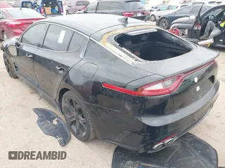 2020 Kia Stinger GT with VIN KNAE35LC2L6078391, listed as a IAAI auction lot 41409482 with 63,146 mi miles. Bid and sale history available at carsss.com. Image 3.