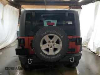 2014 Jeep Wrangler Sport with VIN 1C4AJWAG7EL197285, listed as a Copart auction lot 63451105 with 141,547 mi miles and Salvage title. Bid and sale history available at DreamBid. Image 6.