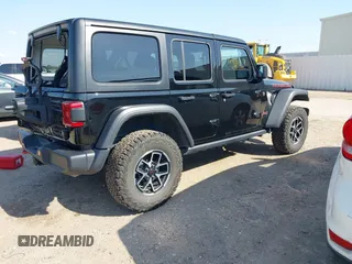 2024 Jeep Wrangler Rubicon with VIN 1C4PJXFG2RW276330, listed as a IAAI auction lot 41866339 with 23,168 mi miles. Bid and sale history available at carsss.com. Image 4.