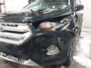 2018 Ford Escape SE with VIN 1FMCU9GD7JUD36295, listed as a IAAI auction lot 41855037 with 85,305 mi miles. Bid and sale history available at carsss.com. Image 6.