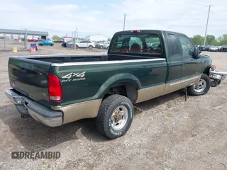 2000 Ford Super Duty F-250 XL with VIN 1FTNX21F9YED75853, listed as a IAAI auction lot 42152135 with 212,078 mi miles. Bid and sale history available at carsss.com. Image 4.