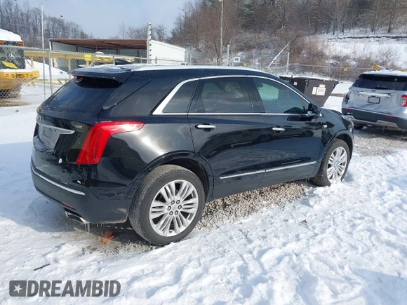 2019 Cadillac XT5 Premium Luxury FWD with VIN 1GYKNERS7KZ234124, listed as a IAAI auction lot 41565312 with 124,037 mi miles and . Bid and sale history available at DreamBid. Image 4.
