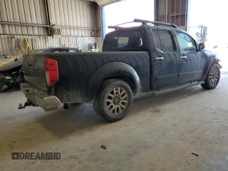 2009 Nissan Frontier LE with VIN 1N6AD09U79C409698, listed as a Copart auction lot 55843545 with 230,334 mi miles and Salvage title. Bid and sale history available at DreamBid. Image 3.