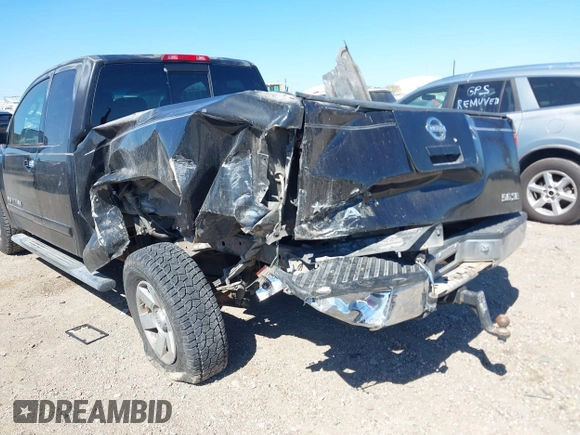 2005 Nissan Titan XE with VIN 1N6BA06A15N560400, listed as a IAAI auction lot 41656560 with 212,568 mi miles. Bid and sale history available at carsss.com. Image 6.