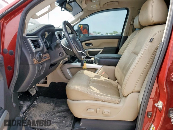 2016 Nissan Titan SL z VIN 1N6BA1F4XGN500750, wystawiony jako Copart lot #57608135 z przebiegiem 126 525 mil mil oraz Czysty tytuł • Clean title. Historia ofert i sprzedaży dostępna na DreamBid. Obrazek 7.