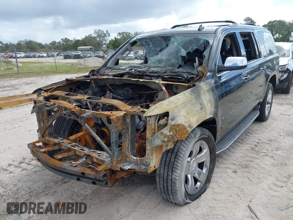 2015 Chevrolet Suburban LTZ with VIN 1GNSCKKC8FR156706, listed as a IAAI auction lot 40638221 with Not Provided miles and . Bid and sale history available at DreamBid. Image 6.