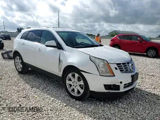 2014 Cadillac SRX Performance Collection with VIN 3GYFNCE39ES687733, listed as a Copart auction lot 62770665 with 151,714 mi miles and Salvage title. Bid and sale history available at DreamBid. Image 14.