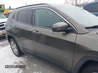 2018 Jeep Compass Altitude with VIN 3C4NJDBB1JT479462, listed as a IAAI auction lot 41276119 with 58,895 mi miles and . Bid and sale history available at carsss.com. Image 13.