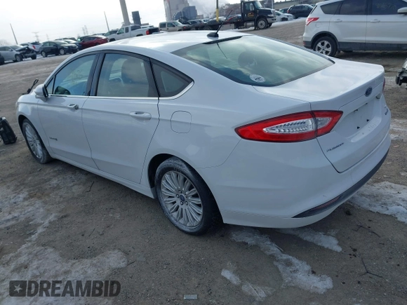 2014 Ford Fusion SE Hybrid with VIN 3FA6P0LU4ER243067, listed as a IAAI auction lot 41378720 with 129,625 mi miles. Bid and sale history available at carsss.com. Image 3.