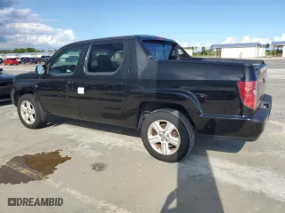 2011 Honda Ridgeline RTL with VIN 5FPYK1F56BB006435, listed as a Copart auction lot 73837234 with 99,034 mi miles and Salvage Title. Bid and sale history available at carsss.com. Image 2.