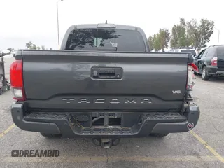2018 Toyota Tacoma SR5 with VIN 3TMAZ5CN1JM071396, listed as a IAAI auction lot 42061640 with 122,148 mi miles and . Bid and sale history available at DreamBid. Image 16.