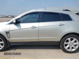 2015 Cadillac SRX Premium Collection with VIN 3GYFNDE38FS561936, listed as a IAAI auction lot 42266801 with 64,820 mi miles and . Bid and sale history available at DreamBid. Image 14.