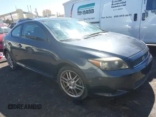 2005 Scion tC with VIN JTKDE167850035303, listed as a IAAI auction lot 40109300 with 84,999 mi miles. Bid and sale history available at carsss.com. Image 1.