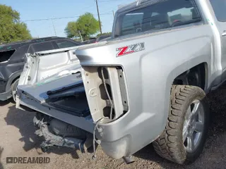 2017 Chevrolet Silverado 1500 LT with VIN 3GCUKREC2HG392487, listed as a IAAI auction lot 41807394 with 113,041 mi miles. Bid and sale history available at carsss.com. Image 21.
