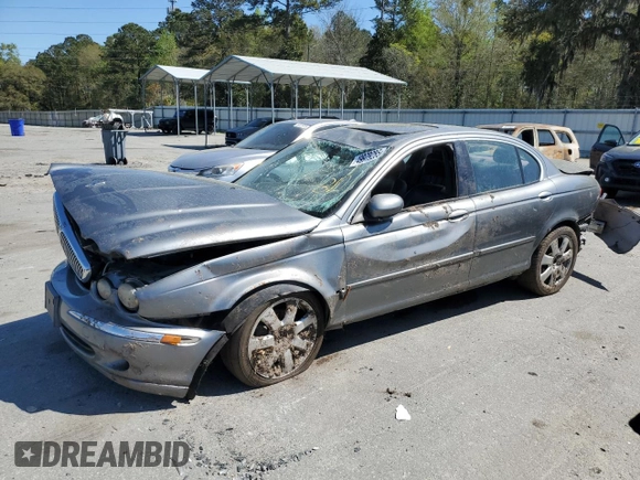 2004 Jaguar X-Type with VIN SAJEA51C04WD91344, listed as a Copart auction lot 49979285 with Not Provided miles and Salvage Title. Bid and sale history available at DreamBid. Image 1.
