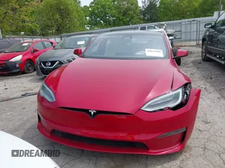 2022 Tesla Model S with VIN 5YJSA1E58NF470737, listed as a IAAI auction lot 42035040 with 15,224 mi miles and . Bid and sale history available at DreamBid. Image 12.