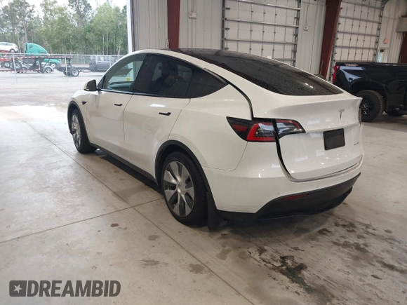 2020 Tesla Model Y Long Range z VIN 5YJYGDEE8LF054338, wystawiony jako IAAI lot #39026888 z przebiegiem 86 142 mil mil oraz . Historia ofert i sprzedaży dostępna na DreamBid. Obrazek 3.