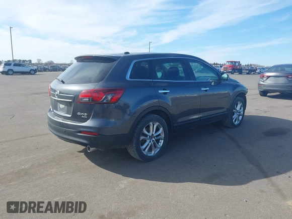 2013 Mazda CX-9 Grand Touring with VIN JM3TB3DA0D0412833, listed as a IAAI auction lot 41876447 with 173,830 mi miles and . Bid and sale history available at carsss.com. Image 4.