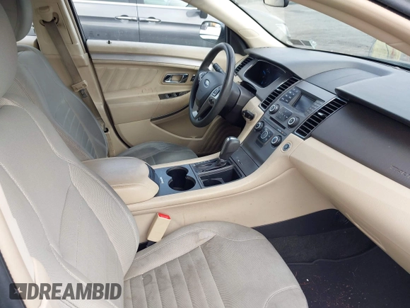 2014 Ford Taurus SE z VIN 1FAHP2D87EG165025, wystawiony jako IAAI lot #42226401 z przebiegiem 209 411 mil mil oraz . Historia ofert i sprzedaży dostępna na DreamBid. Obrazek 5.