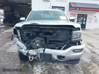 2018 GMC Sierra 1500 Denali with VIN 3GTU2PEJXJG472435, listed as a IAAI auction lot 41376821 with 63,177 mi miles. Bid and sale history available at carsss.com. Image 12.