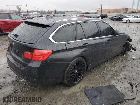 2014 BMW 3 Series 328d xDrive with VIN WBA3K5C59EKT33057, listed as a Copart auction lot 82470424 with 157,288 mi miles and Salvage title. Bid and sale history available at DreamBid. Image 3.