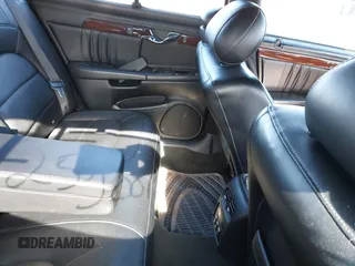 2004 Cadillac DeVille DHS z VIN 1G6KE57YX4U261849, wystawiony jako IAAI lot #41518835 z przebiegiem Nie podano mil oraz . Historia ofert i sprzedaży dostępna na DreamBid. Obrazek 8.