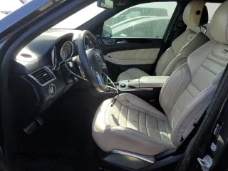 2015 Mercedes-Benz GL with VIN 4JGDF7EE5FA486574, listed as a Copart auction lot 86883394 with 74,698 mi miles and Clean Title. Bid and sale history available at carsss.com. Image 7.