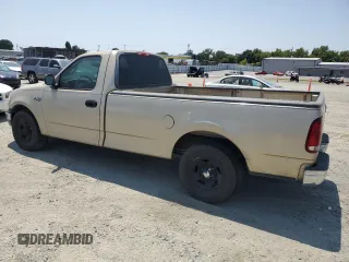 2000 Ford F-150 XL with VIN 1FTZF172XYNB65958, listed as a Copart auction lot 59946145 with 208,988 mi miles and Salvage title. Bid and sale history available at DreamBid. Image 2.